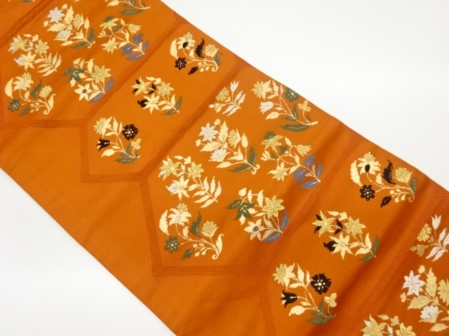 変わり横段に草花模様織出し名古屋帯